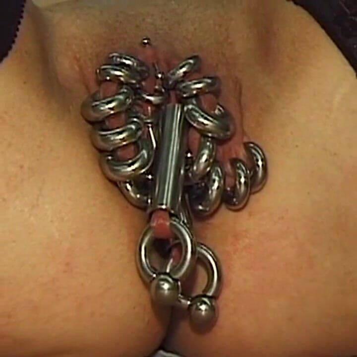 Redhead MILF Shows off Her Extreme Piercings