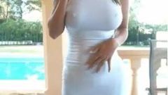 Busty milf outside smoking in see thru white dress