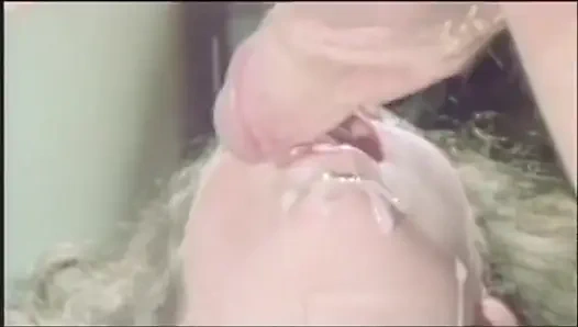 A sweet bitch has some trouble to eat John Holmes's huge cock