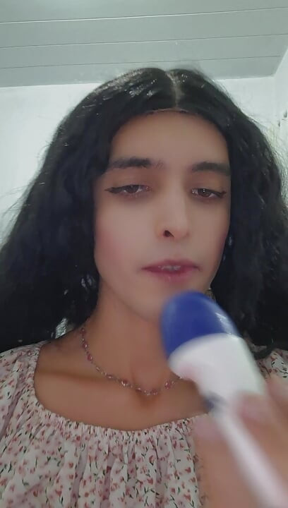 Petite trans girl sucks on deodorant