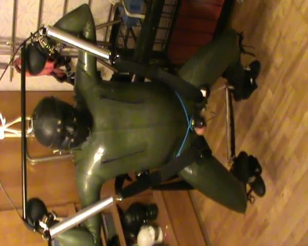 Green and green - swinged rubberslave with electro