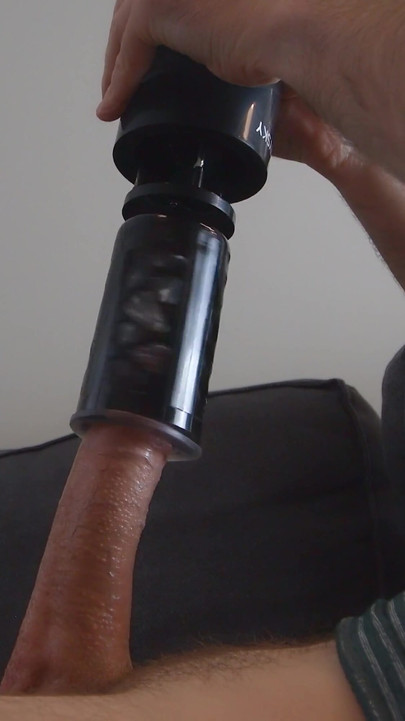 Key moment from "BestVibe STORM CUP 10 Thrusting Spinning Masturbation Cup with Suction Cup. Big cock cumshot"