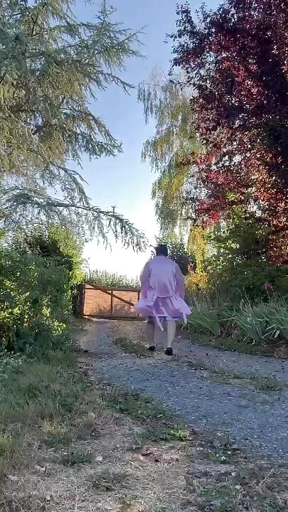 Dressed in a nightgown and robe for a morning