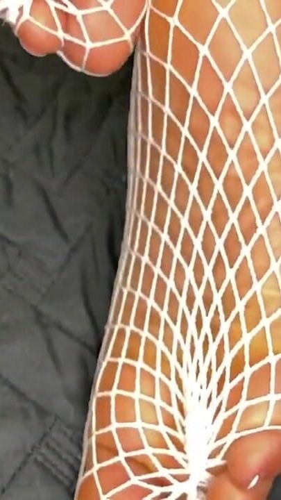 Ebony Girl Shows off Her Feet with French Pedicure in Her White Fishnets