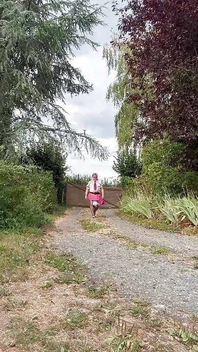 Dressed in a pink plaid mini skirt for a night out