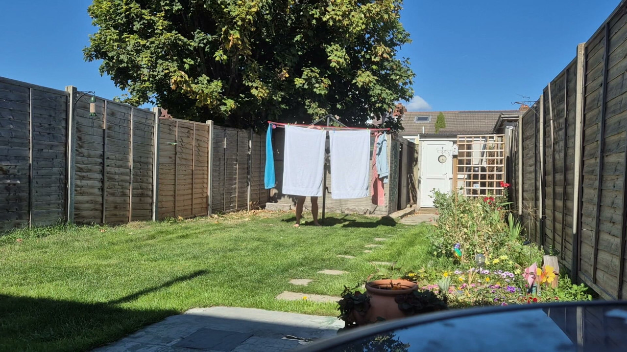 Dared to hang up clothes on washing line