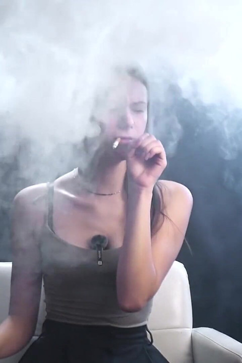 Calm Solo Smoking Session in Studio with Soft Smoke and Direct Eye Contact