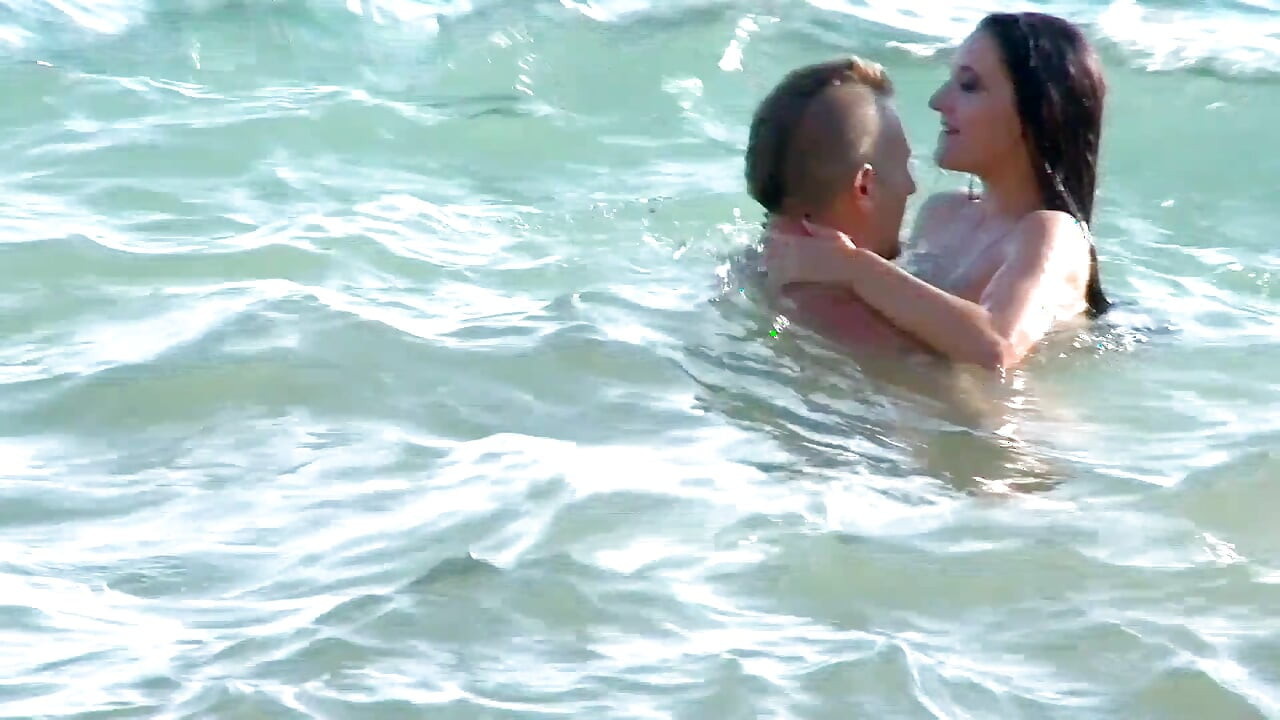 Brunette slut gets fucked doggystyle on the beach