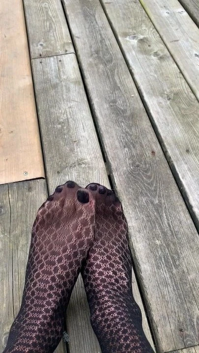 Sexy nylon feet with painted toes