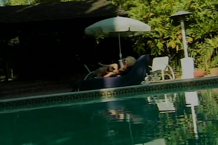 Amazing blonde babe gets a facial after outdoor fuck by the pool