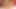 Sarışın orta yaşlı seksi kadın bir adam tarafından sikilirken adamın yarağıyla oynuyor