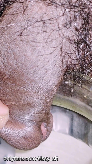 Must-see moment from "Limp little penis crossdresser pissing outdoor"