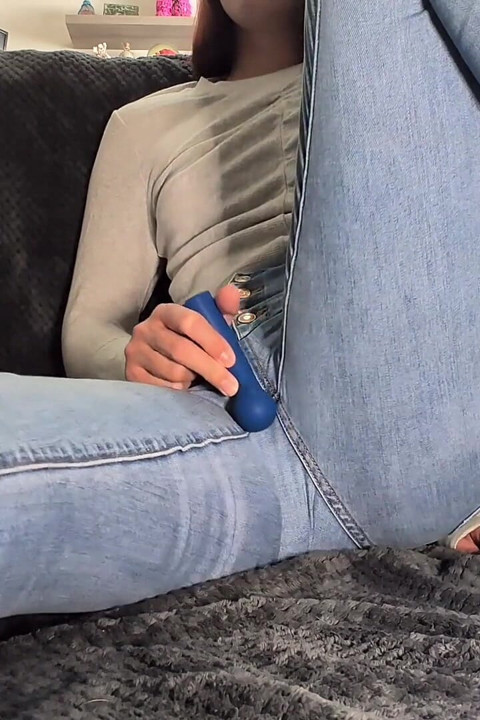 College Girl Soaks Jeans During Intense Orgasm