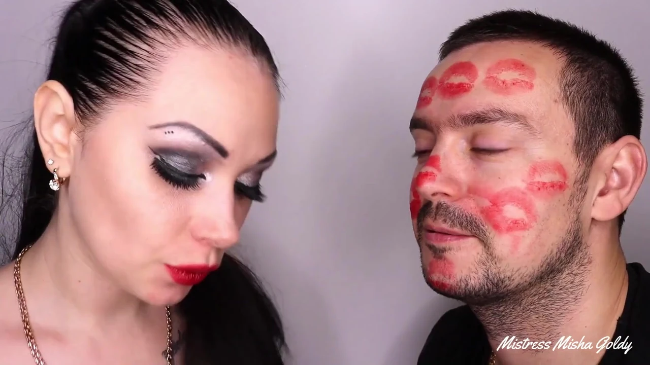Covering Alex with strong red lipsticks kisses all over his face!