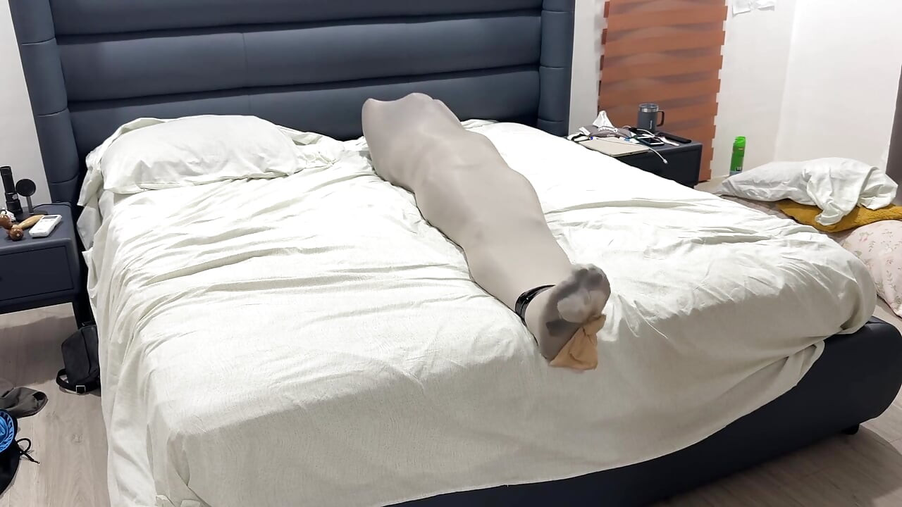 Mummified in Pantyhose Cocoon Vulnerable Encased Inside Nylon