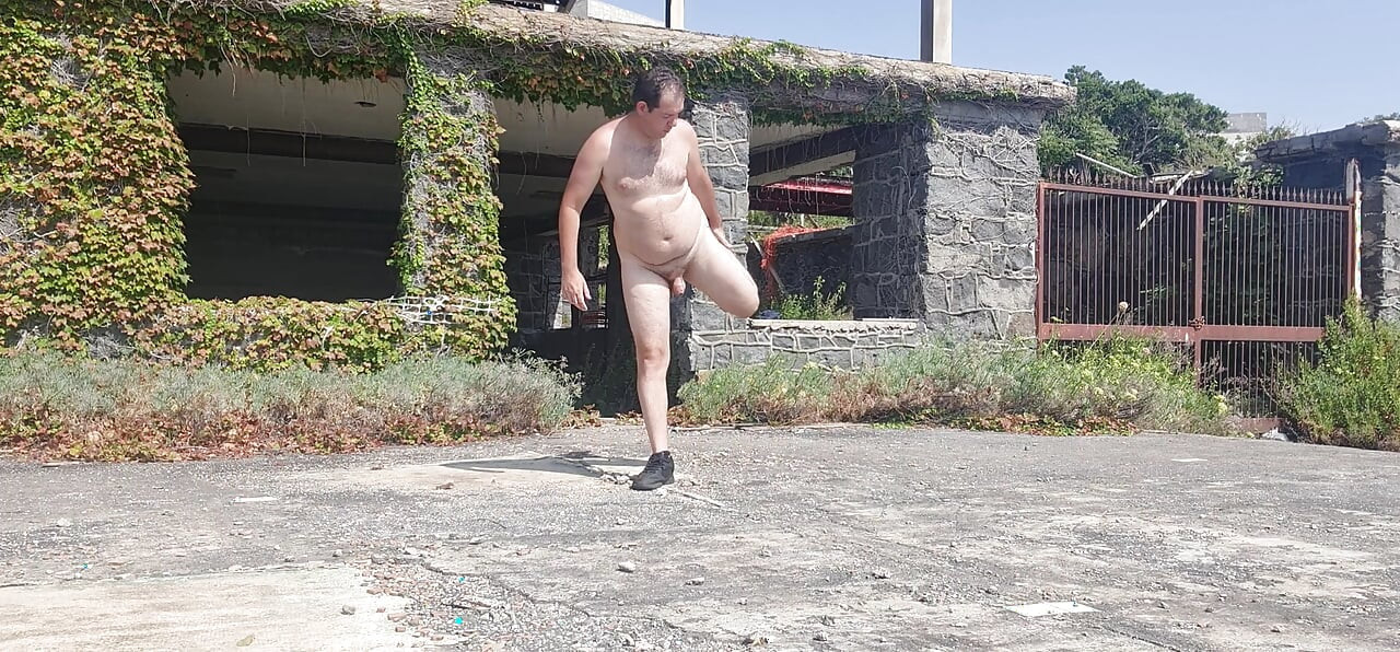 Boy completely naked near the sea