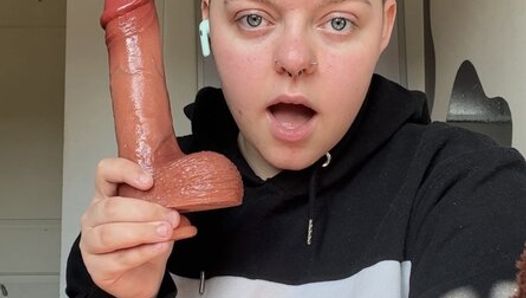 Trans boy Alexander gags on huge dildo