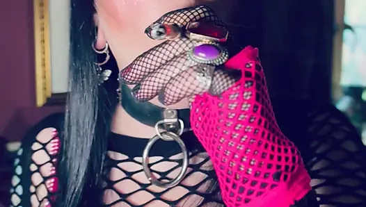 Pink & Delicious Tina Snua Sparks Up A Cigarette In A Holder