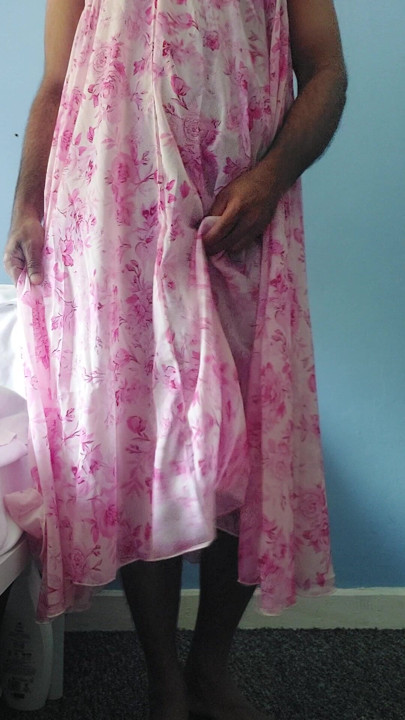 Shemale in a Silky seethrough floral fleared chiffon skirt