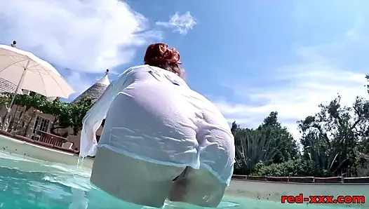 Red XXX feeling horny outside by the pool