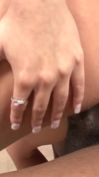 Captivating moment from "Sexy white girl loves it when she rides tattooed black guy's big hard fuck rod"