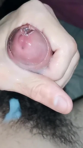 Powerful moment from "A big fountain of sperm from a big dick flooded the hot body of a stallion at night!"