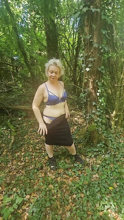 I was touching myself in the woods when a voyeur caught me and fucked my pussy.