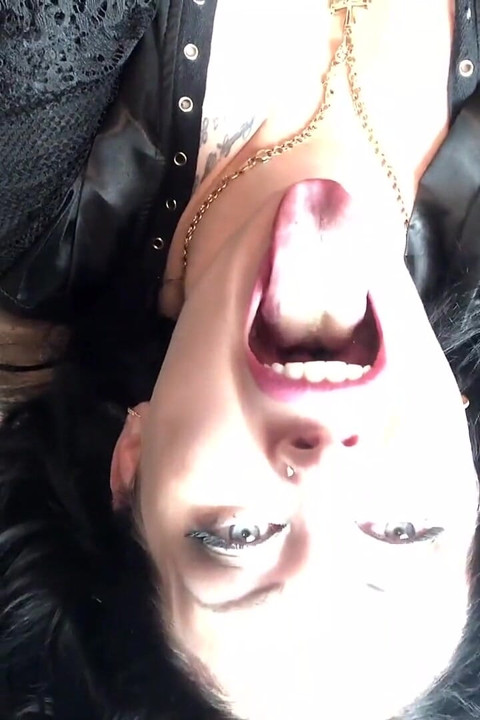 Sexy giantess dangles you above her hungry mouths before consuming you alive
