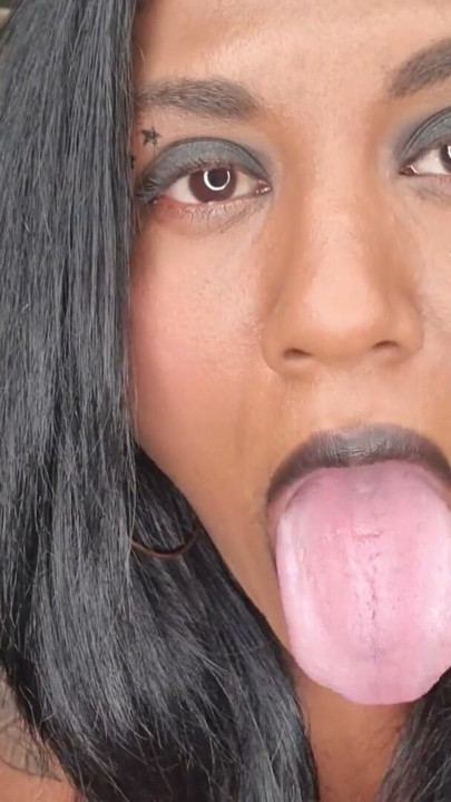 Desi slut dirty talking while playing, displaying her tongue and soft lips | Clip 3