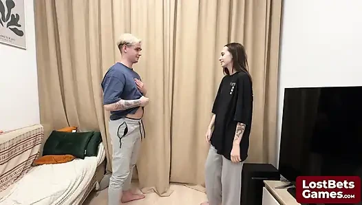 James and Sofia engaged in a strip hand-slap game