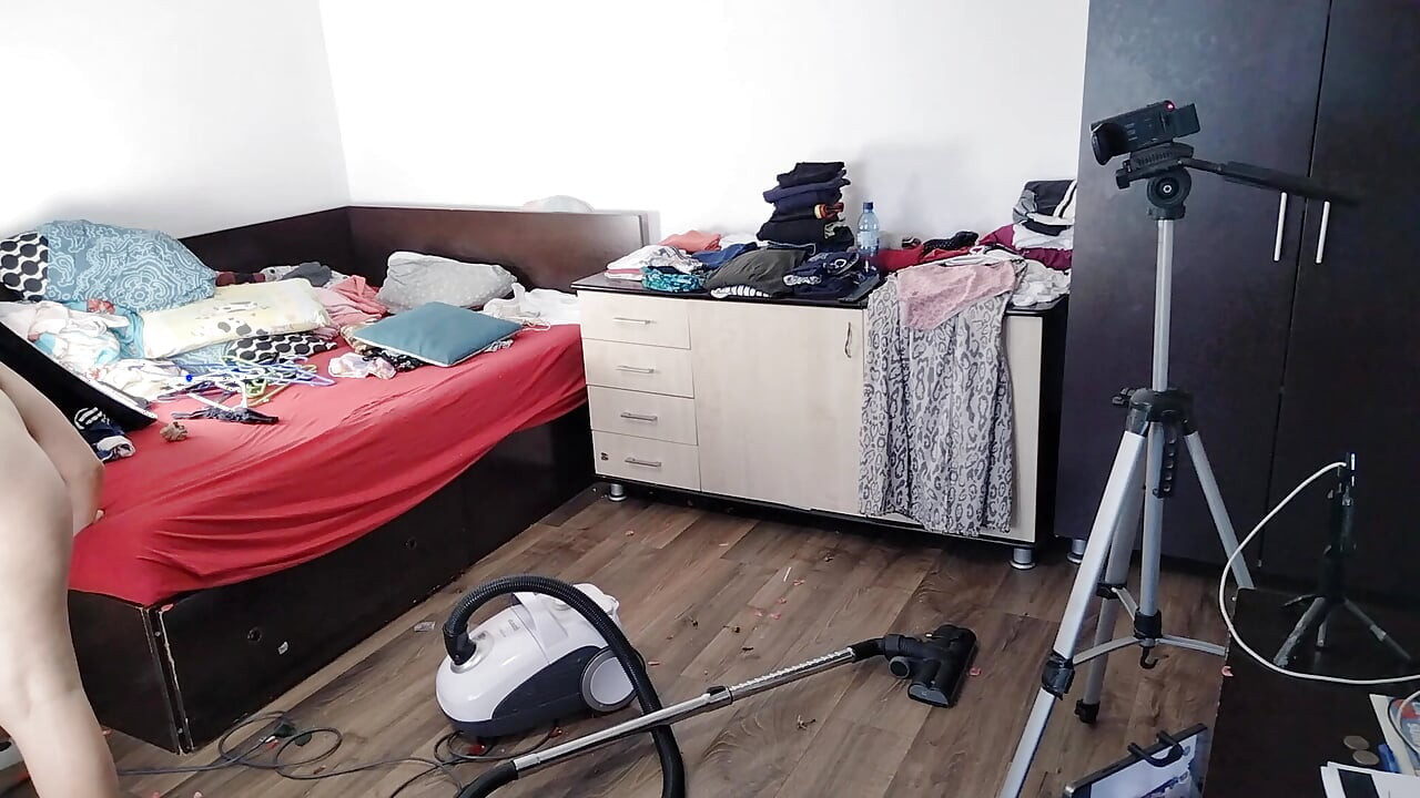 Amateur Emma vacuuming the room. Amateur wife gives me a handjob until I cum