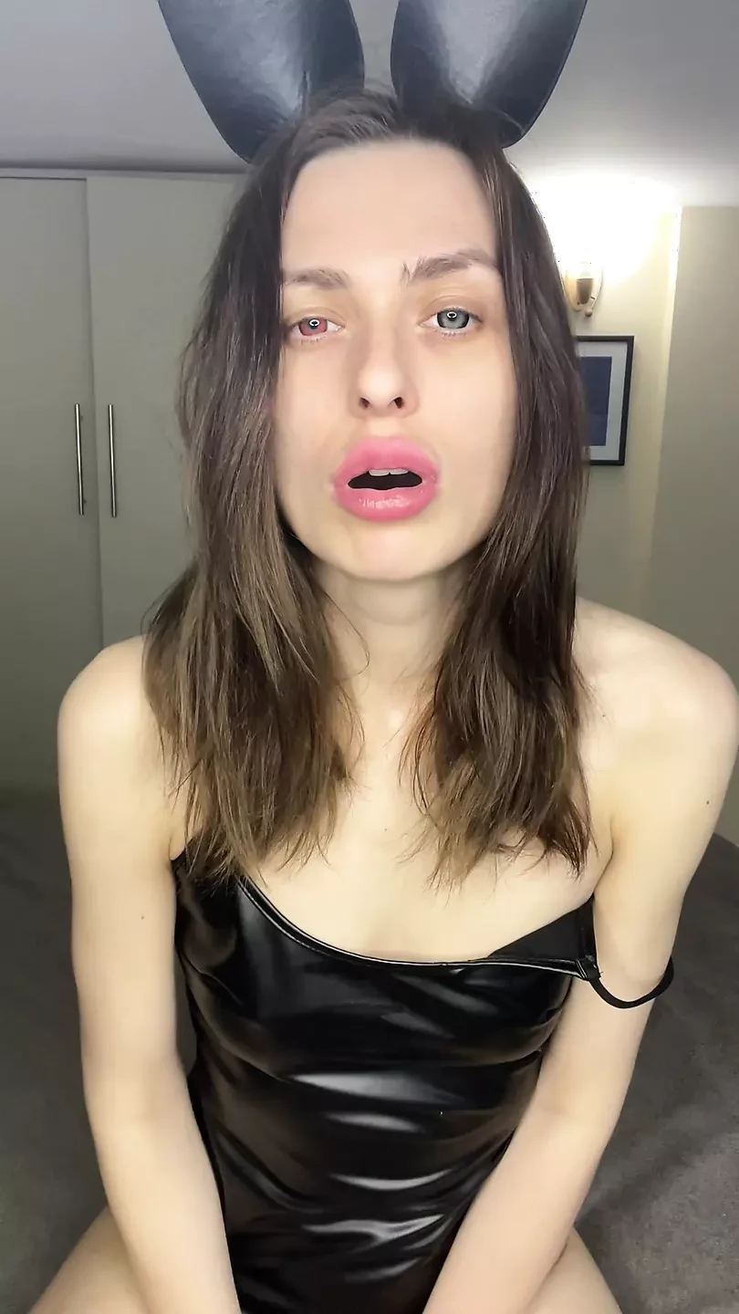 Daniella smokes and dominates you with just her eyes – soft femdom teasing in black lingerie