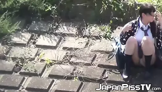 Japanese schoolgirls pee in nature during lunchtime