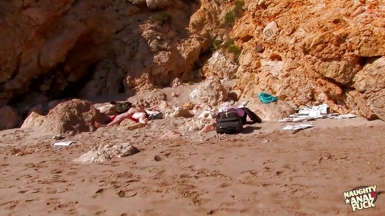 A voluptuous brunette becomes aroused at the beach and chooses to perform oral sex on him.