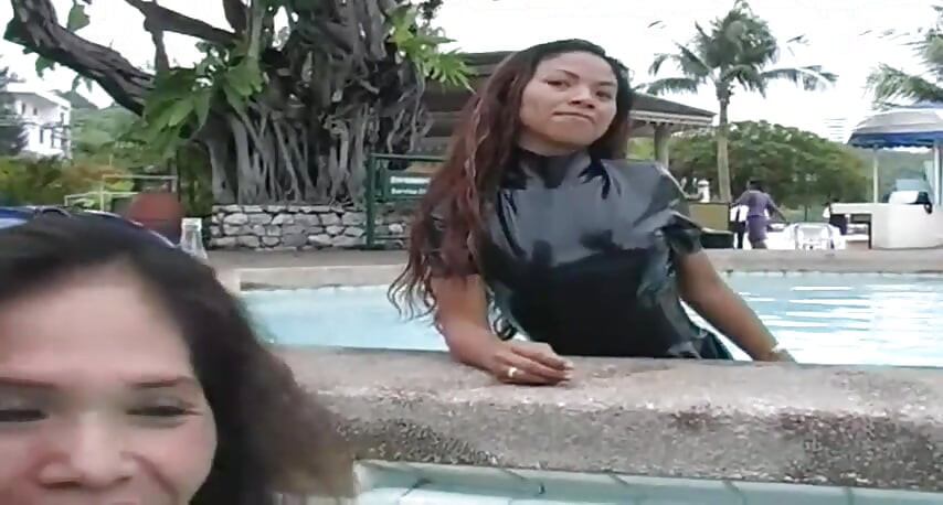 2 sexy Latina's presenting latex fetish in the pool and on the beach