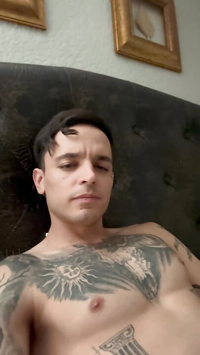 Adult starts to insert piercing into hole and pre