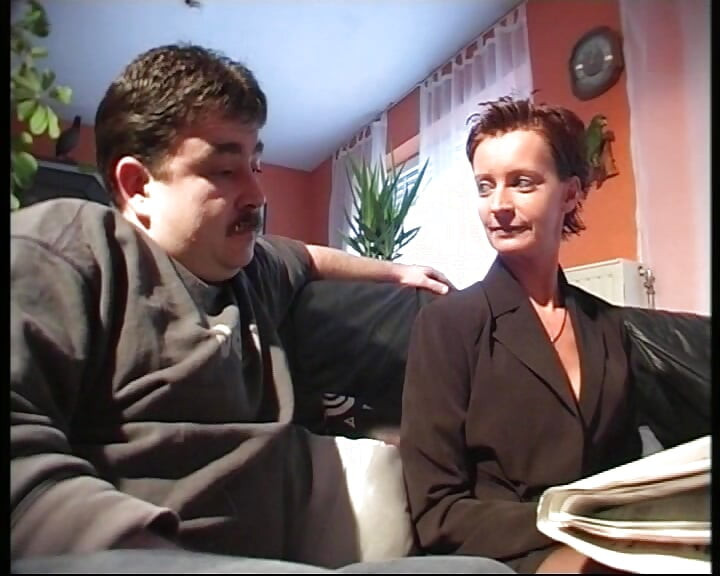 Sexy German slut in stockings takes care of two cocks