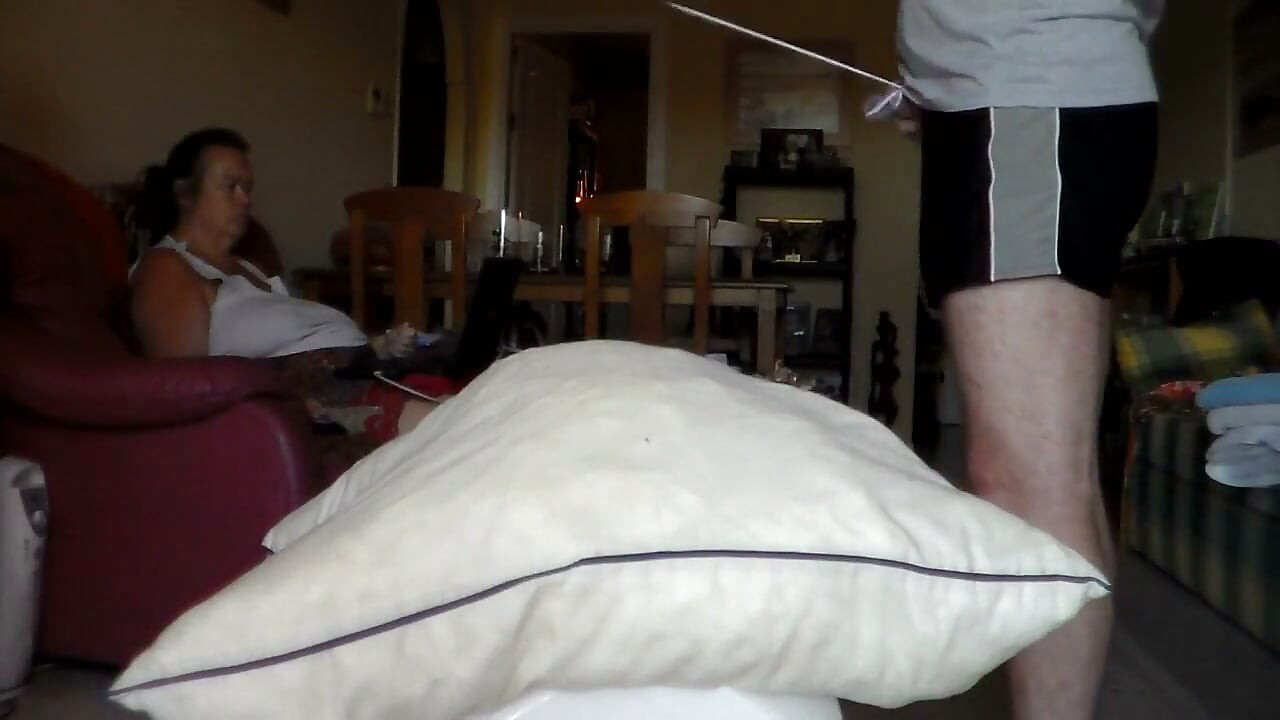 John is peeing all on a pillow