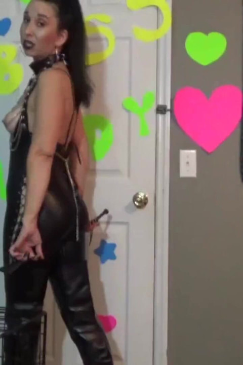 Solo mistress wearing latex shows her tits while talking dirty