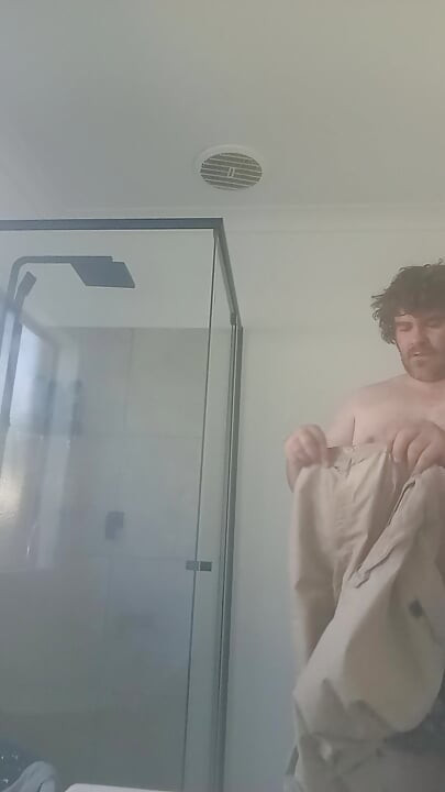Big old bear pissing in chastity