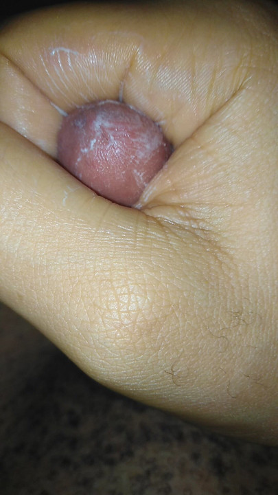 Masturbating