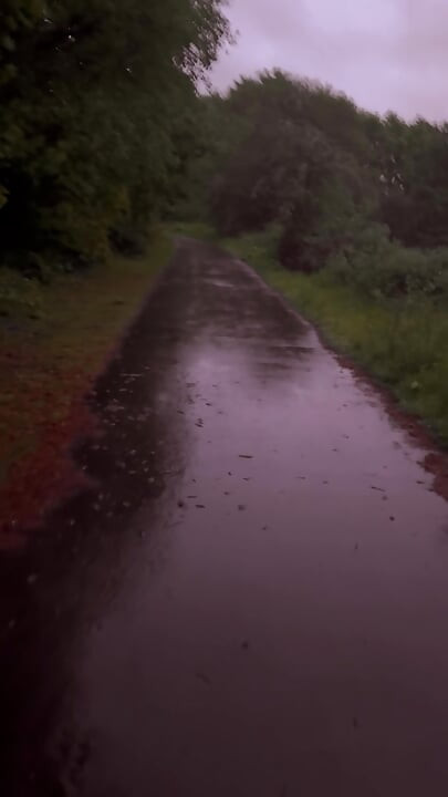Left clothes in car for a barefoot naked walk in the rain down a lane never walked even clothed