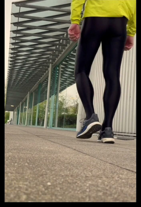 In a see-through bodysuit in the sports shop