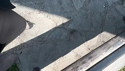 Sexy hot stepmom is horny and caresses herself on a park bench