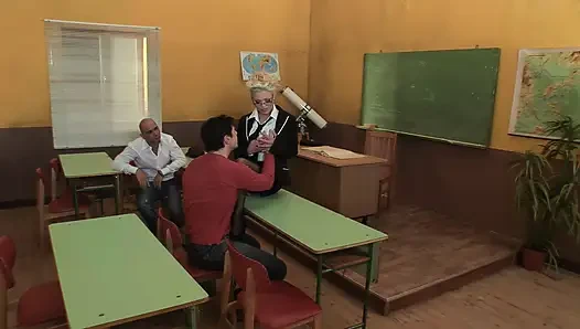 Teacher Rewards His Students at the Desk
