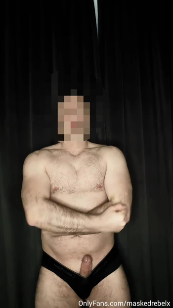 Hot guy stroking his thick cock on the couch