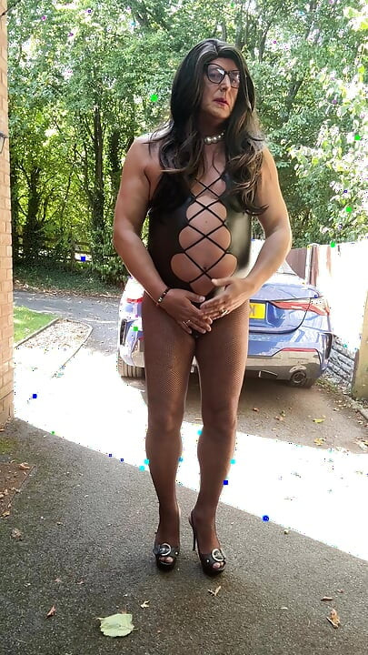 Sexy Crossdresser Kellycd2022's in black pvc bodysuit and fishnet pantyhose