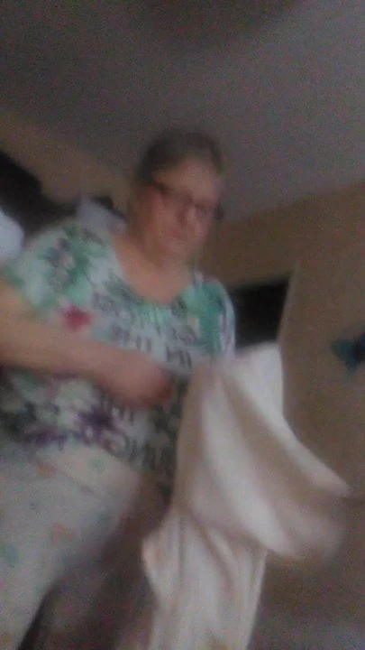 my wife is getting ready to put on pajamas