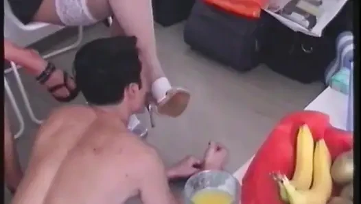 Making her slave get naked and lick feet of hers and her friend's