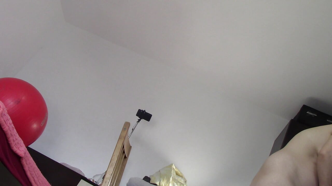 Amateur wife dancing naked at home. Amateur woman has fun trying on clothes and cutting them.
